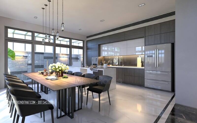 Bộ bàn ghế ăn, đèn thả, tủ bếp acrylic, laminate đã tạo nên vẻ đẹp sang trọng, độc đáo cho phòng ăn liền bếp. Thiết kế nội thất