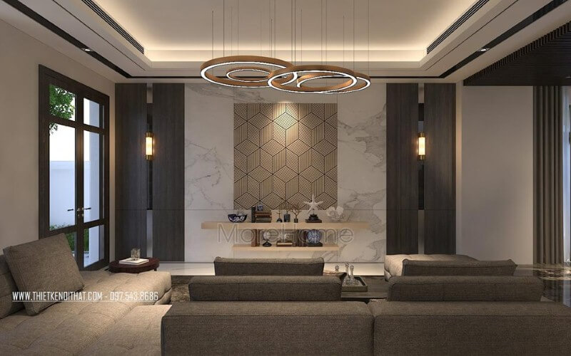 Bố trí phòng khách hiện đại ấn tượng với đá ốp tường cao cấp cùng họa tiết 3D độc đáo. Thiết kế nội thất biệt thự tại Hà Nội