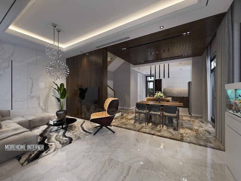Điểm nhấn ấn tượng giữa gỗ ốp tường cùng đá lát sàn cao cấp tạo nên ánh nhìn hiện đại, độc đáo cho phòng khách liền bếp ăn. Thiết kế nội thất biệt thự tại Hà Nội