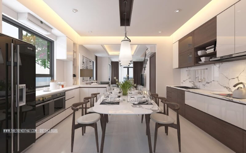 Phòng bếp hiện đại độc đáo với nội thất gỗ óc chó chủ điểm nhấn. Thiết kế nội thất biệt thự tại Hà Nội